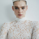 CATROUX MINI PEPLUM DRESS IN CHANTILLY LACE